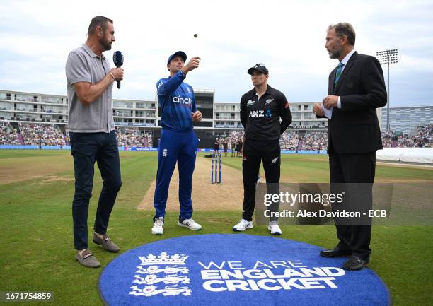 England captain Jos Buttler performs the toss alongside New Zealand captain Tom Latham and ICC Match Referee Chris Broad ahead of the 2nd Metro Bank...