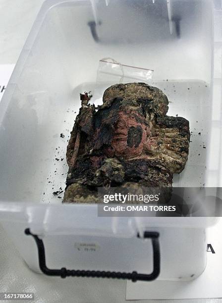 One of the statues representing one of the Aztec Gods were found in a stone box next to the steps believed to be part of the temple of God Tlaloc in...