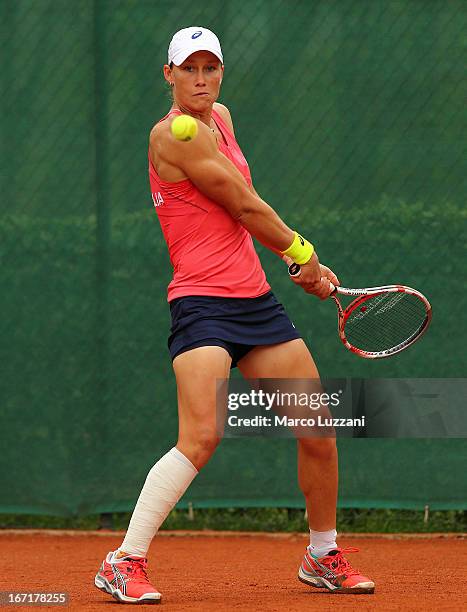 Samantha Stosur of Australia plays a backhand against Romina Oprandi of Switzerland during day three of the Fed Cup World Group Play-Offs between...