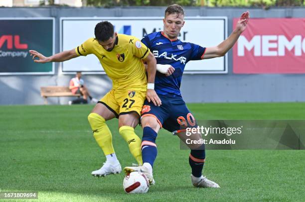 Valon Ethemi of Istanbulspor and Eden Karzev of RAMS Basaksehir compete during the Turkish Super Lig week 5 football match between Istanbulspor and...