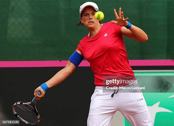 Romina Oprandi of Switzerland plays a forehand against Samantha Stosur of Australia during day three of the Fed Cup World Group Play-Offs between...