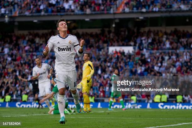 Mesut Ozil of Real Madrid CF celebrates scoring their opening goal during the La Liga match between Real Madrid CF and Real Betis Balompie at...