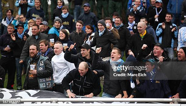 Fans of Muenchen celebrate the first goal of the match during the Regionalliga Bayern match between FV Illertissen and 1860 Muenchen II at...