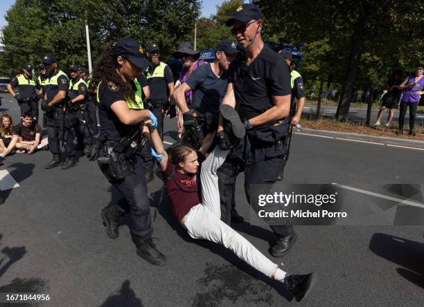 Climate activist is removed from the A12 motorway as it is blocked for the second day in a row in protest against the government’s support for the...