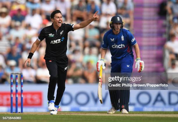 Trent Boult of New Zealand reacts as he dismisses Joe Root of England as Harry Brook looks on during the 2nd One Day International between England...