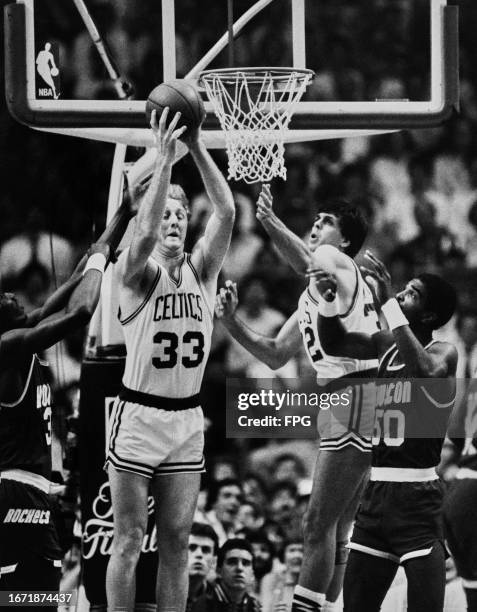 American basketball player Larry Bird, Celtics small forward, and his Celtics teammate, American basketball player Kevin McHale, Celtics power...
