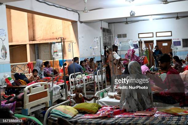 Patients suffering from dengue fever are being treated inside the Mugdha General Hospital's admission section in Dhaka, Bangladesh on September 17,...