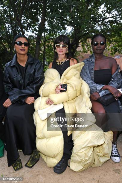 Simran Randhawa, Magda Kaczmarska and Abuk Joseph attend the Holzweiler show during London Fashion Week September 2023 at Camley Street Natural Park...