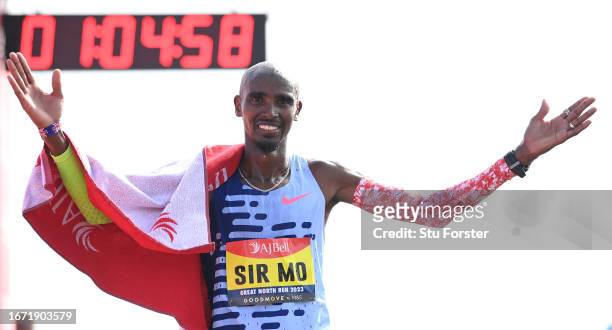 Sir Mo Farah of Great Britain crosses the finish line for fourth place in the Elite Men race in his final race during the AJ Bell Great North Run...