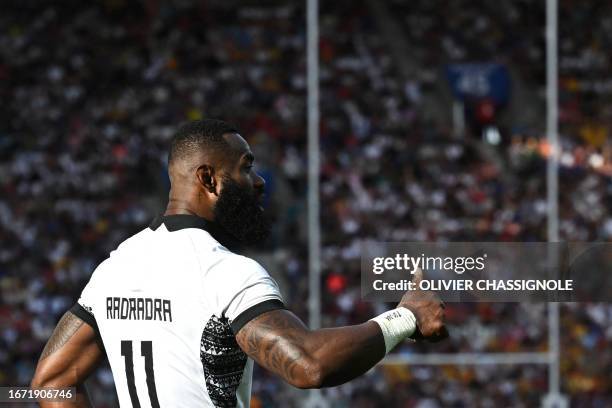 Fiji's left wing Semi Radradra gives a thumbs up at the start of the France 2023 Rugby World Cup Pool C match between Australia and Fiji at Stade...