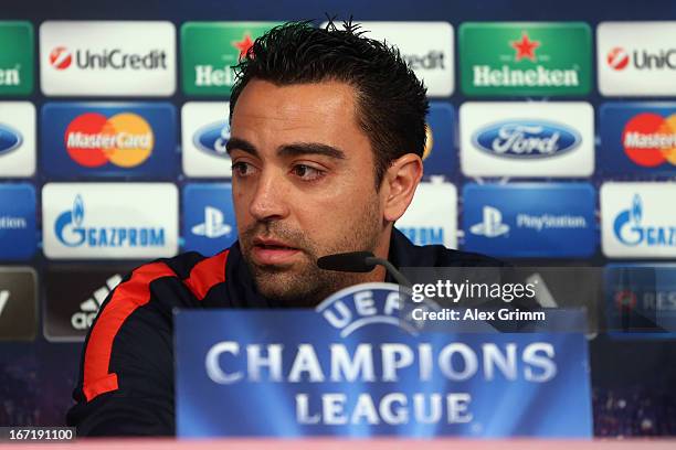 Xavi Hernandez talks to the media during a FC Barcelona press conference ahead of their UEFA Champions League Semi Final first leg match against FC...