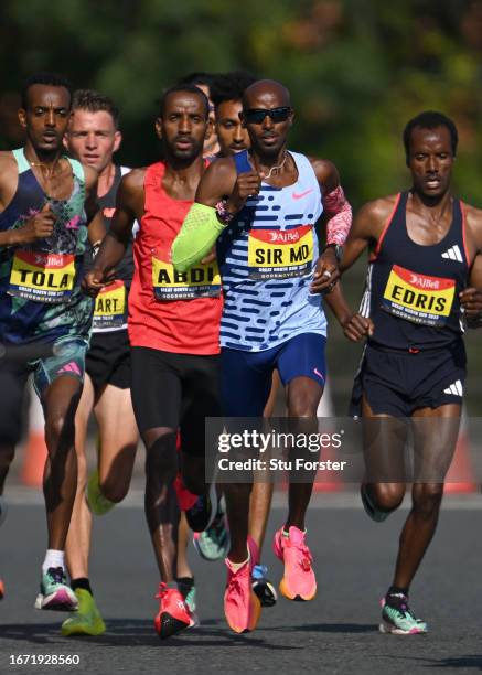 Sir Mo Farah of Great Britain in the leading pack before eventually finishing in fourth place in the Elite Men race in his final race during the AJ...