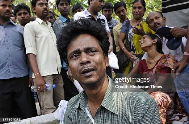 The distraught agents and investors of a chit fund company Saradha group protest against Group's chairman Sudipta Sen and demanding his arrest at...