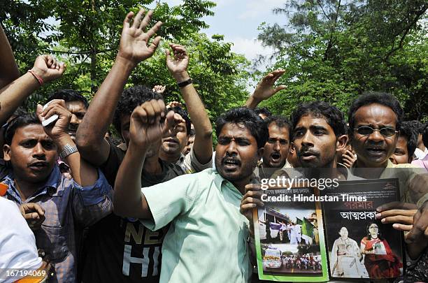 The distraught agents and investors of a chit fund company Saradha group protest against Group's chairman Sudipta Sen and demanding his arrest at...