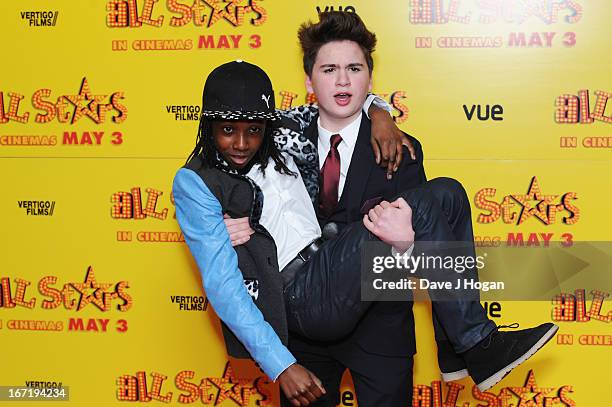 Akai and Theo Stevenson attend the UK premiere of 'All Stars' at The Vue West End on April 22, 2013 in London, England.