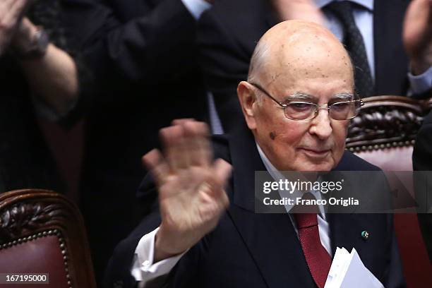 Newly reelected President Giorgio Napolitano waves as he leaves the Italian Parliment at Palazzo Montecitorio on April 22, 2013 in Rome, Italy....