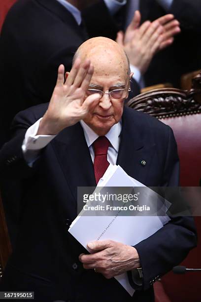 Newly reelected President Giorgio Napolitano waves as he leaves the Italian Parliment at Palazzo Montecitorio on April 22, 2013 in Rome, Italy....