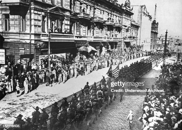 Troops on parade through the streets of Vladivostok during a celebration held in their honor, Vladivostok, Russia, October 24, 1918.