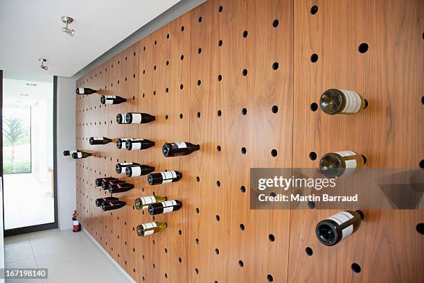 wine rack in modern house - wine rack stock pictures, royalty-free photos & images