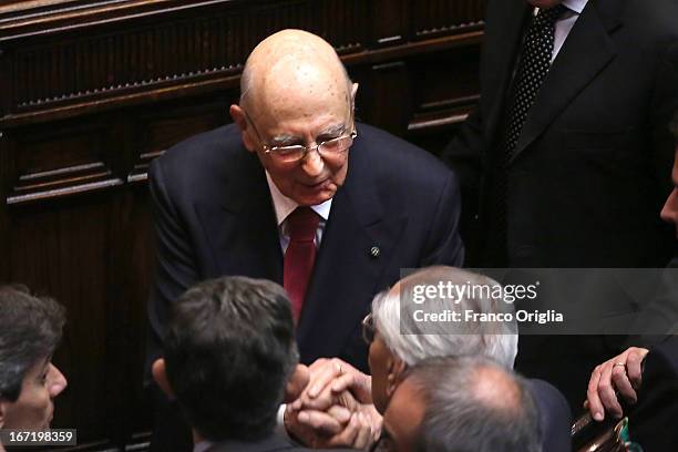 Newly reelected President Giorgio Napolitano receives congratulations as he leaves the Italian Parliment at Palazzo Montecitorio on April 22, 2013 in...