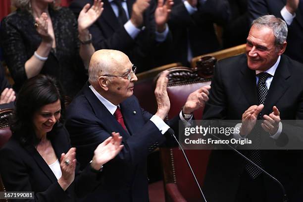 Newly reelected President Giorgio Napolitano applaudes with President of Senate Pietro Grasso and President of the Chamber of Deputies Laura Boldrini...