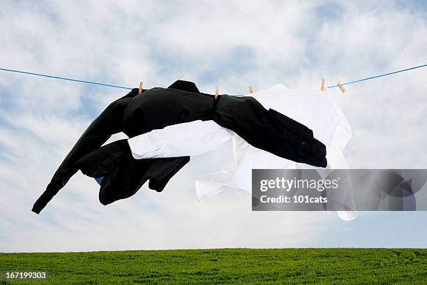 fresh laundry - black shirt folded stock pictures, royalty-free photos & images