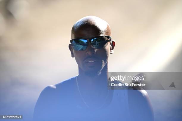Sir Mo Farah of Great Britain looks on as heads to the start line before eventually finishing in fourth place in the Elite Men race in his final race...