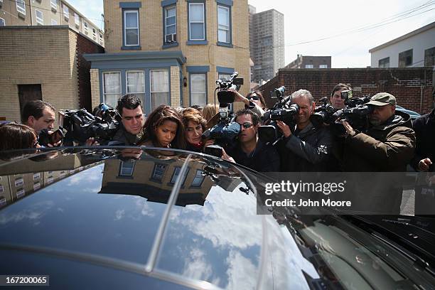 The media surrounds Attorney Joseph Ginarte's car after he visited Alina Tsarnaeva, sister of accused Boston Marathon bombers Tamerlan and Dzhokhar...