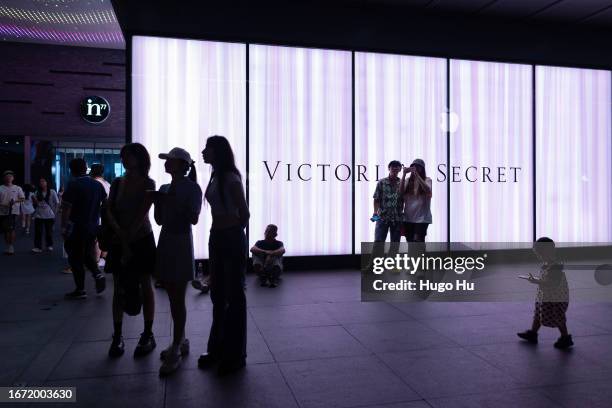 People are seen in front of a Victoria's Secret store on September 10, 2023 in Hangzhou, China.