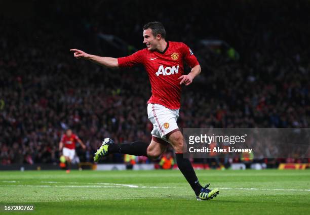 Robin van Persie of Manchester United celebrates scoring his hat trick goal during the Barclays Premier League match between Manchester United and...