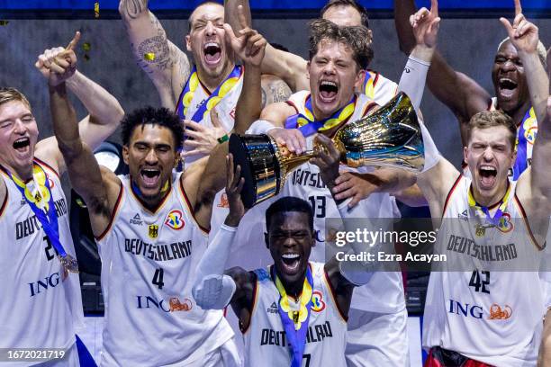 Germany celebrates after winning the FIBA Basketball World Cup Final between Germany and Serbia at Mall of Asia Arena on September 10, 2023 in...