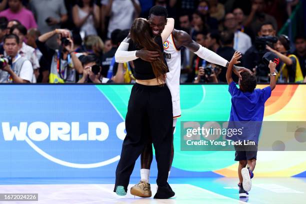 Dennis Schroder of Germany celebrates with his wife Ellen Ziolo and his son after the FIBA Basketball World Cup Final victory over Serbia at Mall of...