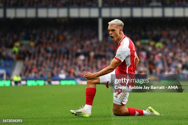 Leandro Trossard of Arsenal celebrates after scoring a goal to make it 0-1 during the Premier League match between Everton FC and Arsenal FC at...