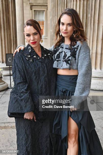 Billie Piper and Lily James attend the Erdem show during London Fashion Week September 2023 at The British Museum on September 17, 2023 in London,...