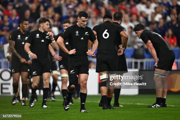 New Zealand players cut dejected figures after the second French try during the Rugby World Cup France 2023 match between France and New Zealand at...