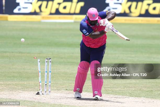 Rahkeem Cornwall of Barbados Royals is bowled by Dwaine Pretorius of Guyana Amazon Warriors during the Republic Bank Caribbean Premier League T20...