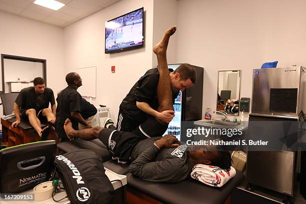 Gerald Wallace of the Brooklyn Nets stretches before the game against the Chicago Bulls in Game One of the Eastern Conference Quarterfinals during...