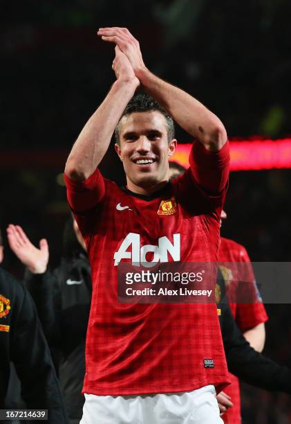 Robin van Persie of Manchester United celebrates victory and winning the Premier League title after the Barclays Premier League match between...