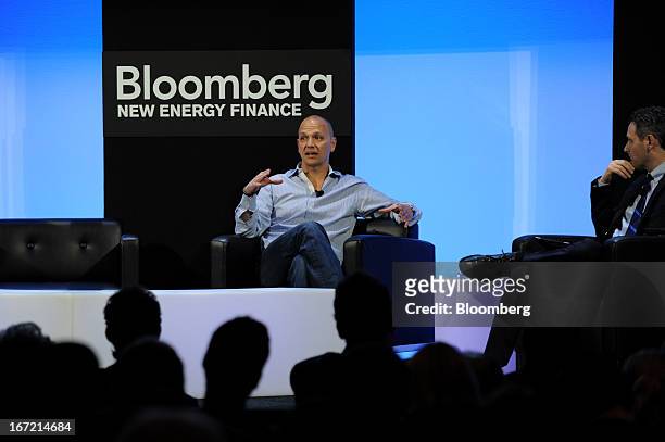 Tony Fadell, founder and chief executive officer of Nest Labs, left, speaks during an "Innovator Interview" at the Bloomberg New Energy Finance...