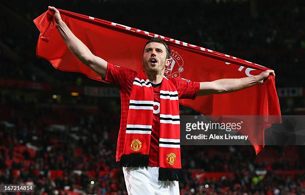 Michael Carrick of Manchester United celebrates victory and winning the Premier League title after the Barclays Premier League match between...