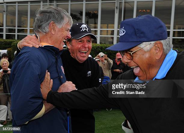 Mike Hill, Gary Player, and Lee Trevino prepare to to play the first hole during the first round of the Demaret Division at the Liberty Mutual...