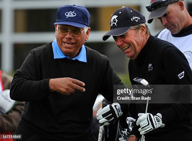 Lee Trevino and Gary Player exchange comments on the first hole during the first round of the Demaret Division at the Liberty Mutual Insurance...