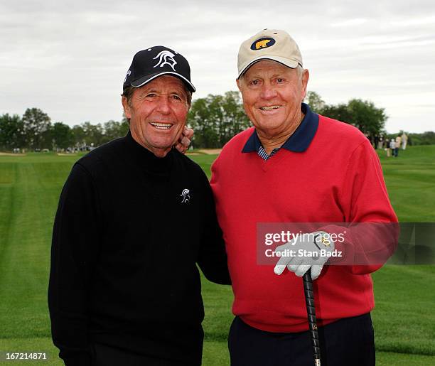 Gary Player and Jack Nicklaus pose for a photo on the first hole during the first round of the Demaret Division at the Liberty Mutual Insurance...