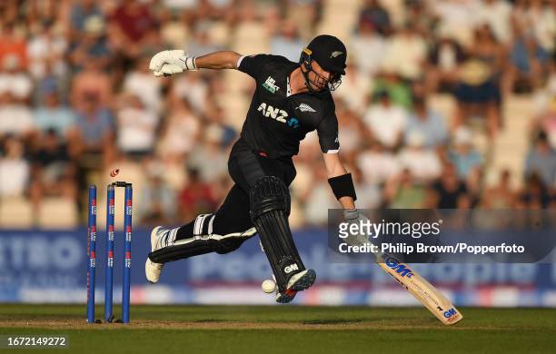Will Young of New Zealand is run out by David Willey during the 2nd One Day International between England and New Zealand at The Ageas Bowl on...