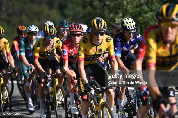 Sepp Kuss of The United States and Team Jumbo-Visma - Red Leader Jersey and Ivan Garcia Cortina of Spain and Movistar Team compete during the 78th...