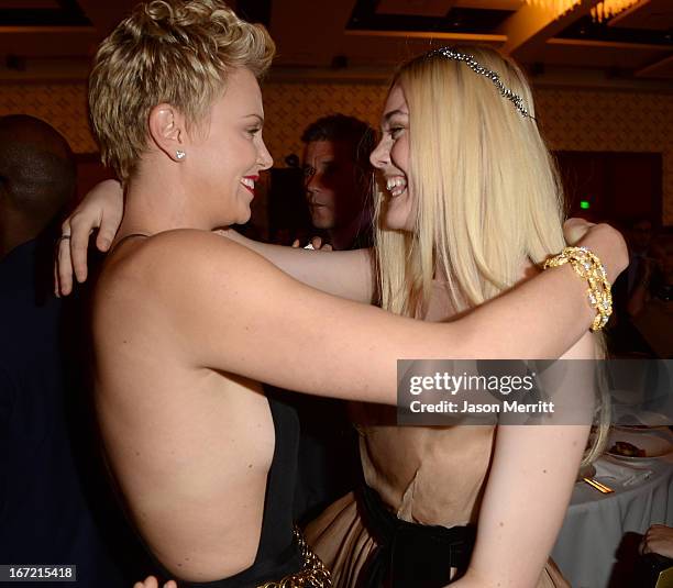 Actresses Charlize Theron and Elle Fanning attend the 24th Annual GLAAD Media Awards at JW Marriott Los Angeles at L.A. LIVE on April 20, 2013 in Los...