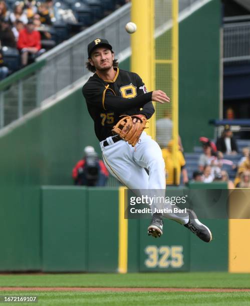 Alika Williams of the Pittsburgh Pirates throws to first base to force out Oswaldo Cabrera of the New York Yankees in the second inning during the...