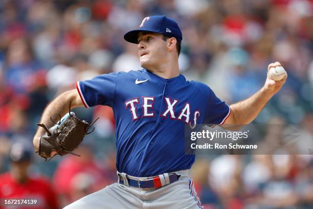 Cody Bradford of the Texas Rangers pitches against the Cleveland Guardians during the second inning at Progressive Field on September 17, 2023 in...