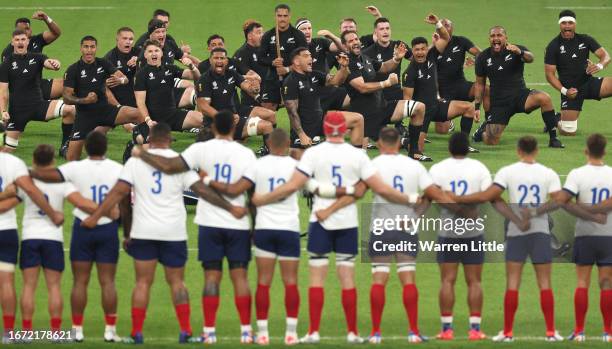 The New Zealand team perform the Haka ahead of the Rugby World Cup France 2023 match between France and New Zealand at Stade de France on September...