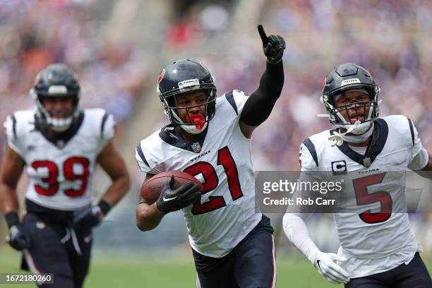 Steven Nelson of the Houston Texans celebrates after intercepting the ball against the Baltimore Ravens during the first half at M&T Bank Stadium on...